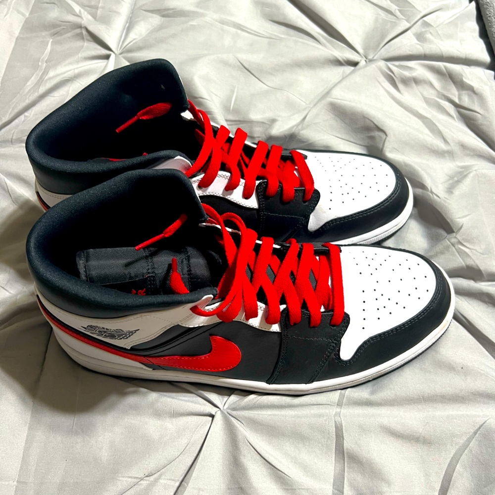 Jordan black and red high top, size 13. Worn only a few times. Great condition